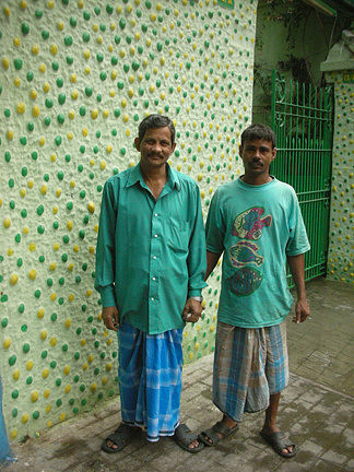 Men By Turquoise Dotted Wall